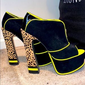Black, neon green, and leopard print ankle boots